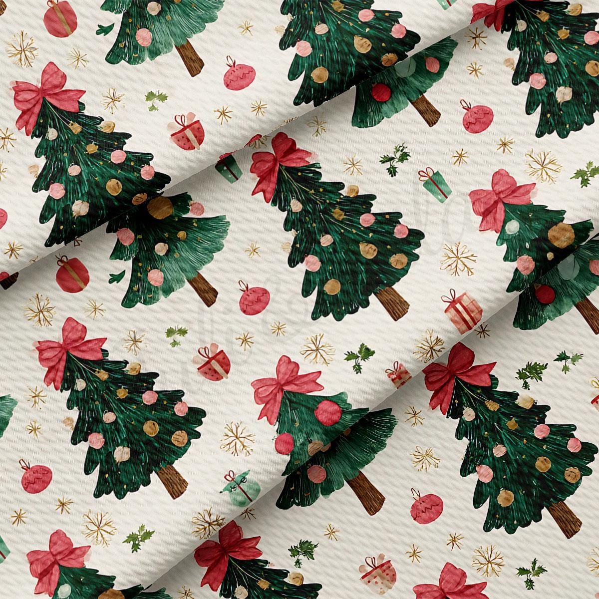 a repeating pattern of Christmas trees with red bows, surrounded by various holiday decorations such as ornaments, presents, and stars.