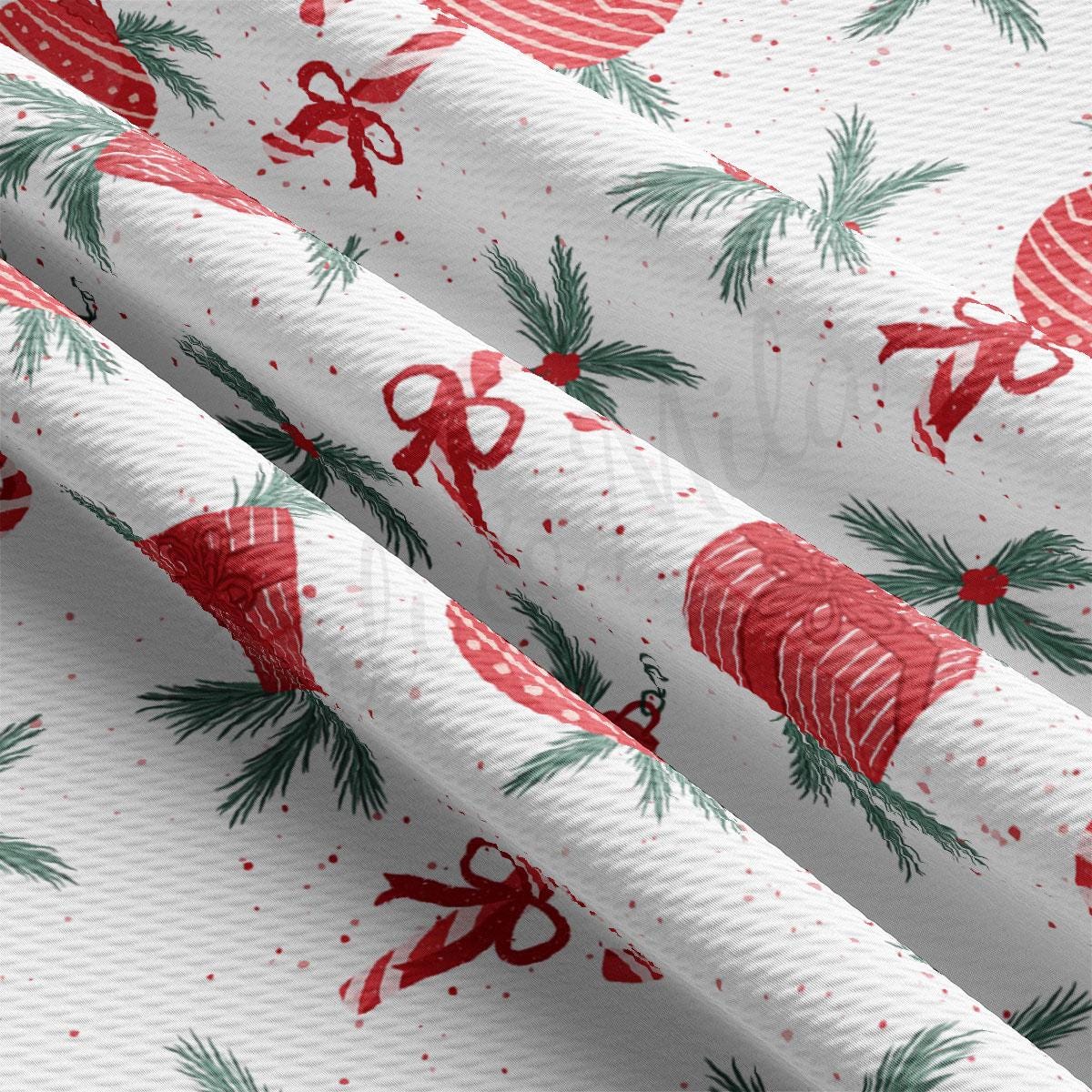 a white wrapping paper with red and green christmas decorations
