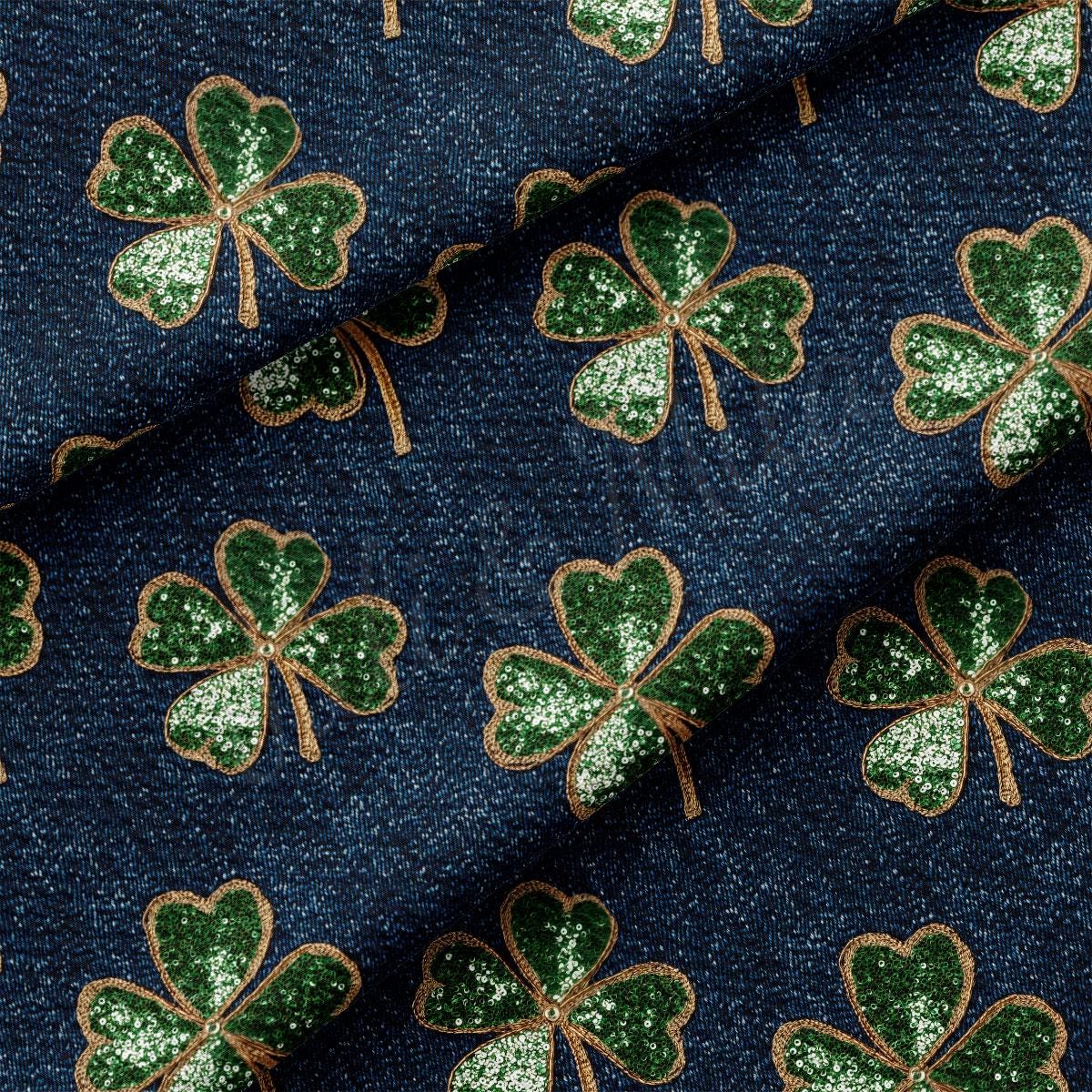 a close up of a fabric with shamrocks on it