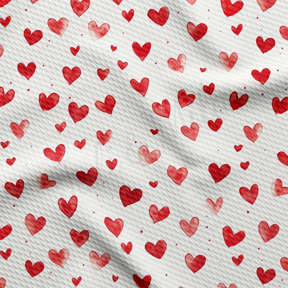 a repeating pattern of red hearts on a white background.