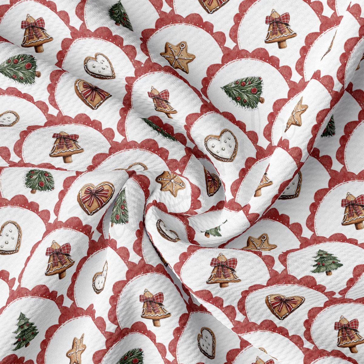 The image is a close-up of a fabric with a repeating pattern of Christmas-themed decorations, including gingerbread men, Christmas trees, and other festive elements.