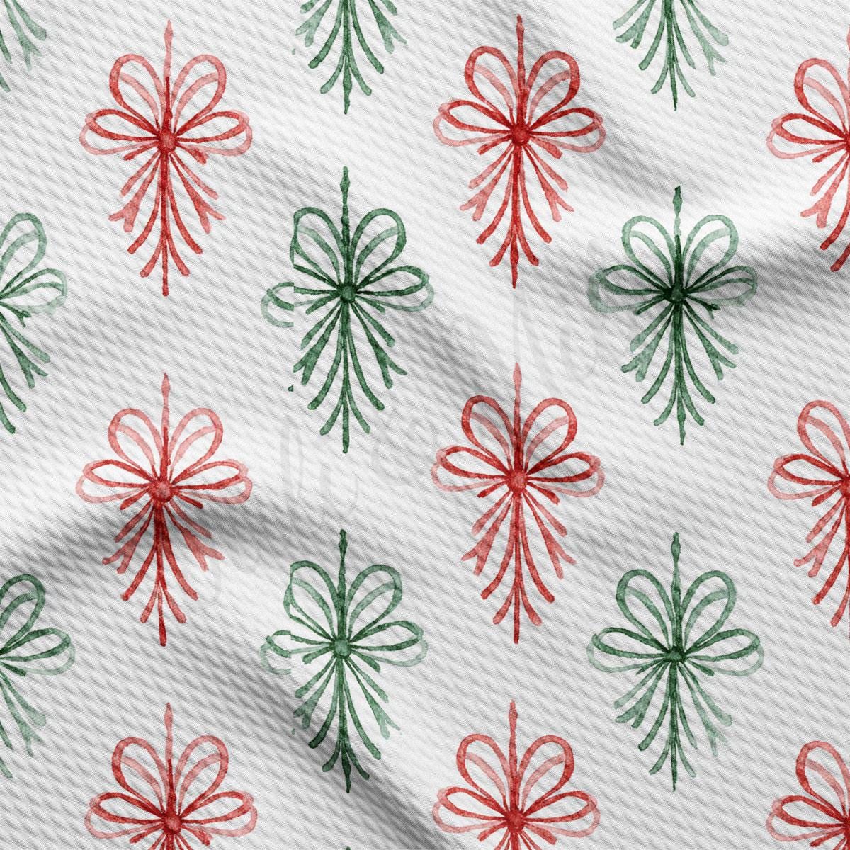 a repeating pattern of red and green bows on a white background.