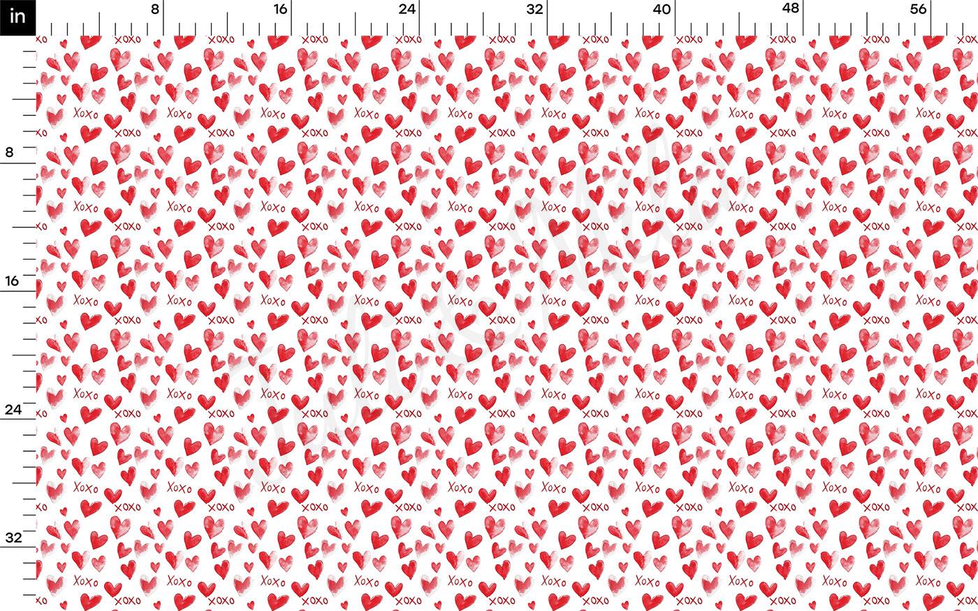 a repeating pattern of red hearts on a white background. The pattern is composed of numerous small red hearts arranged in a grid-like fashion, creating a visually striking and vibrant design.