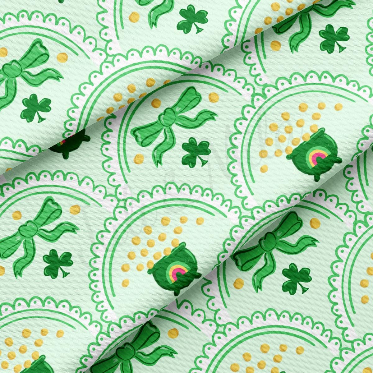 a close up of a green and yellow pattern on a white background