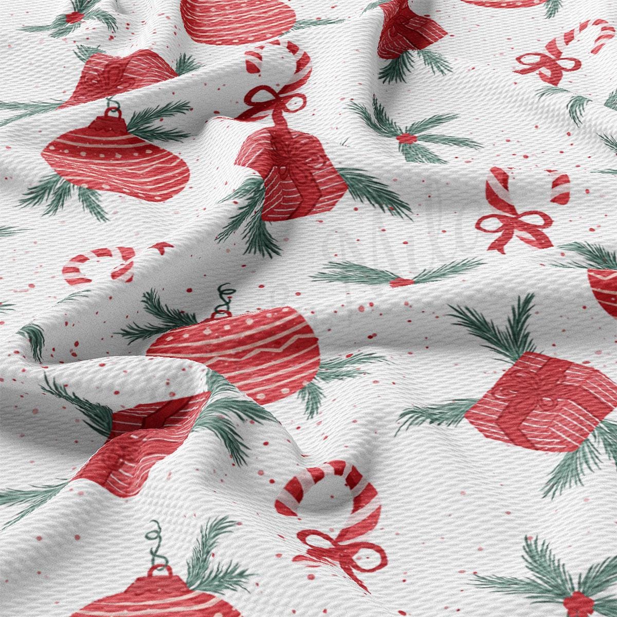 a red and green christmas ornament on a white background