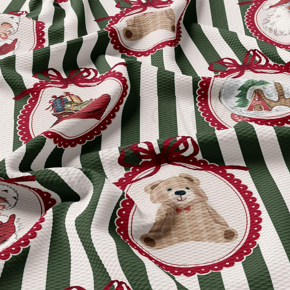 The image is a close-up of a fabric with a repeating pattern of green and white stripes, red bows, and various Christmas-themed illustrations, including a teddy bear.