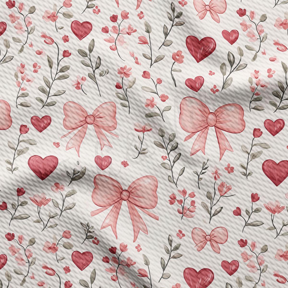 a repeating pattern of pink bows, hearts, and flowers on a white background.