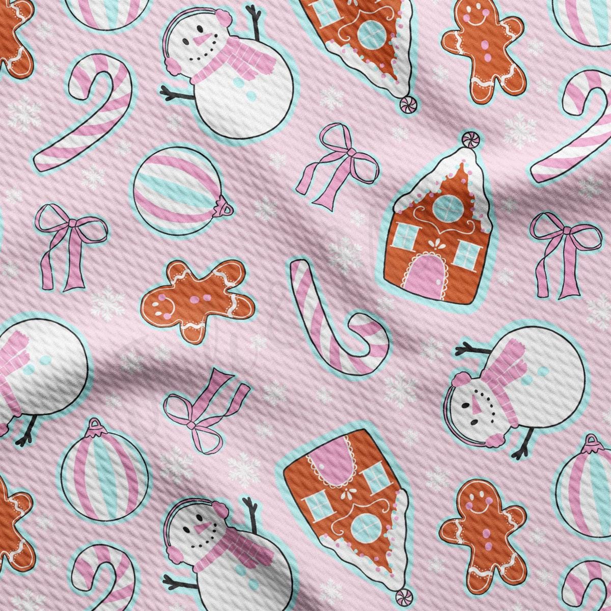 a pink background with snowmen and gingerbreads
