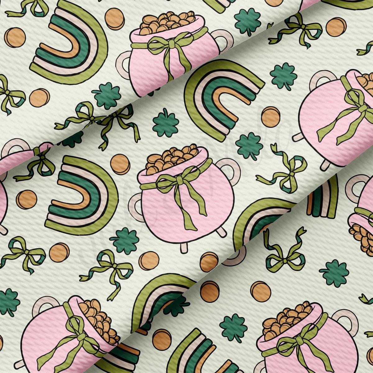 a pink and green pattern with a pot of gold