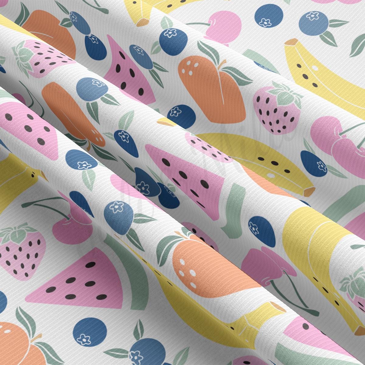 a pattern of fruit on a white background