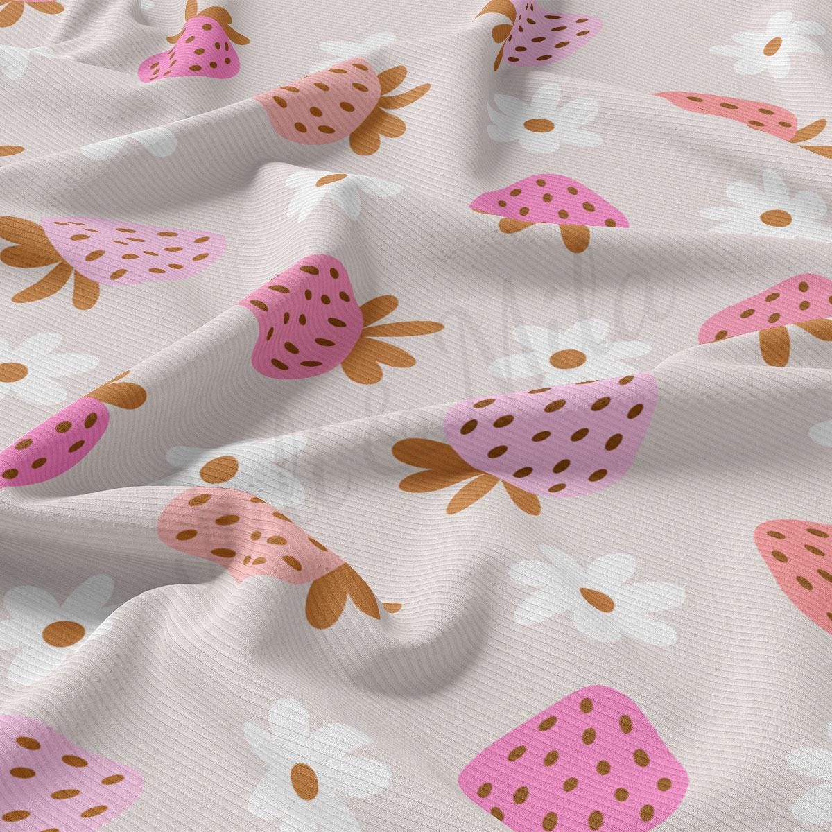 a close up of a white and pink fabric with strawberrys on it