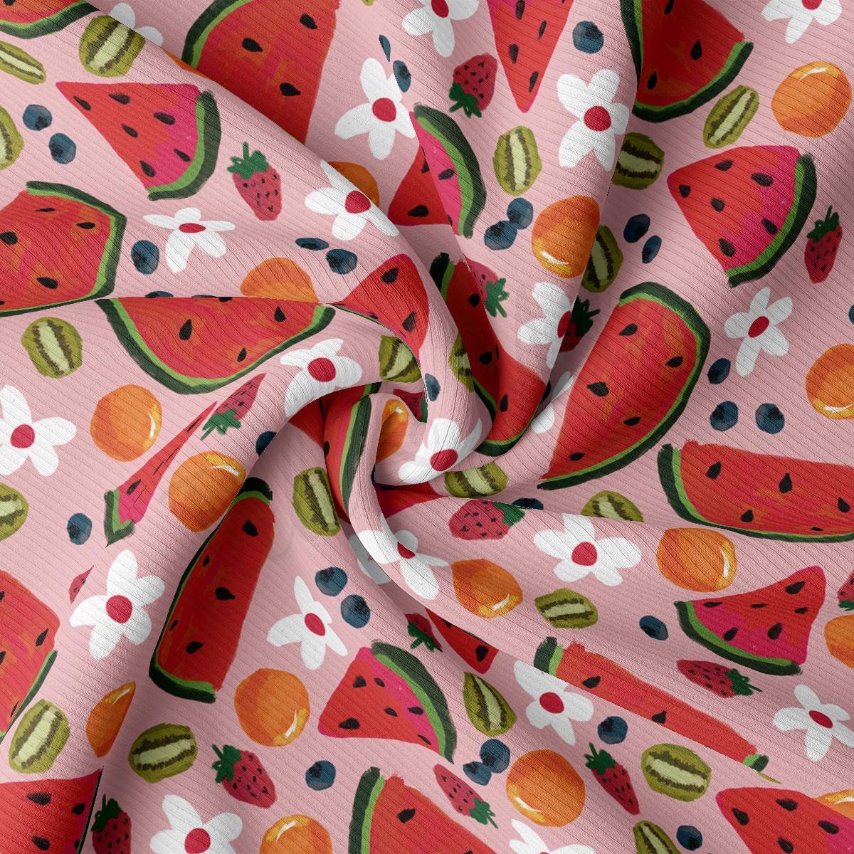 a close up of a pink fabric with watermelon on it
