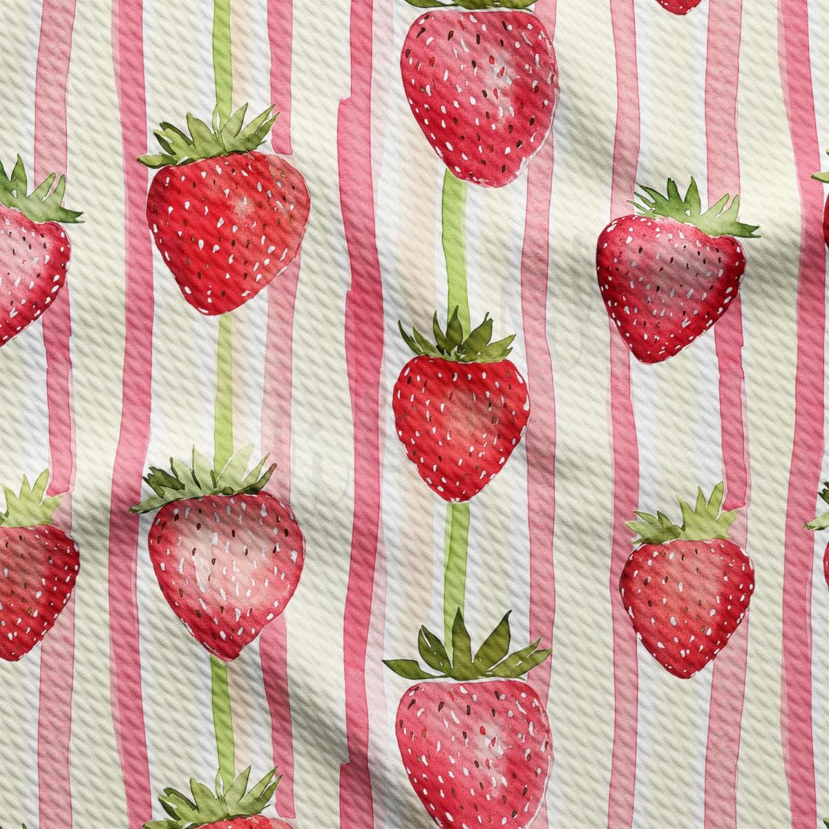 a pattern of strawberries on a pink and white striped background