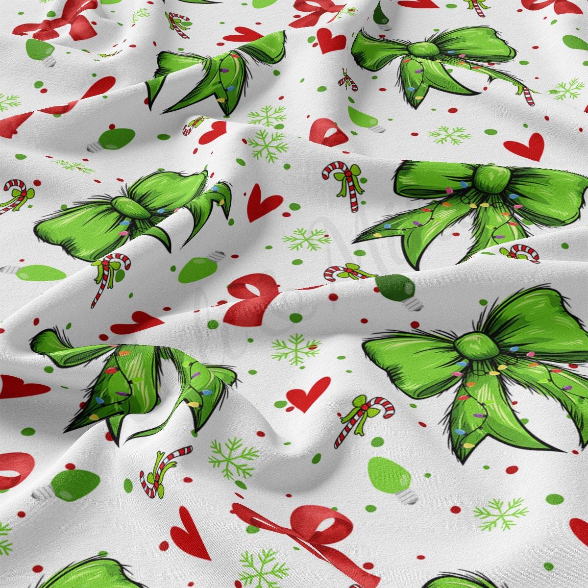 a festive pattern with green bows, red hearts, snowflakes, and candy canes. The pattern is spread across a white background, creating a visually appealing and colorful design.