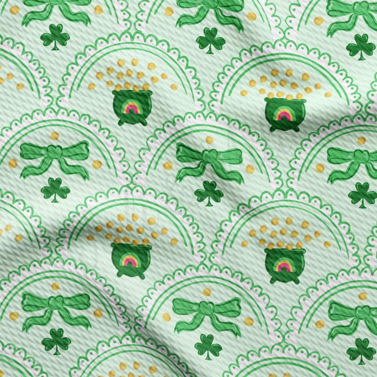 a green and white pattern with shamrocks on it