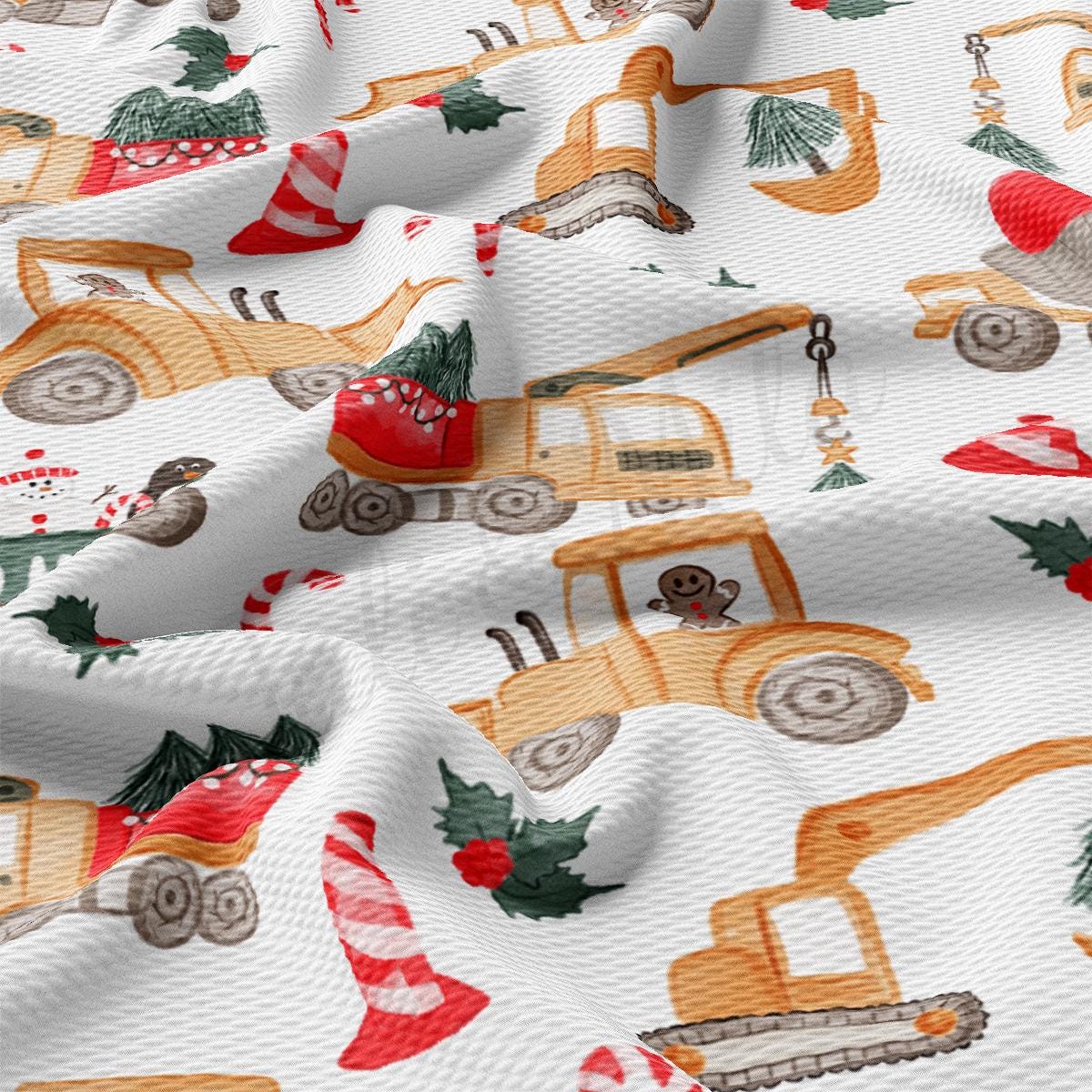 a close up of a white fabric with a christmas theme