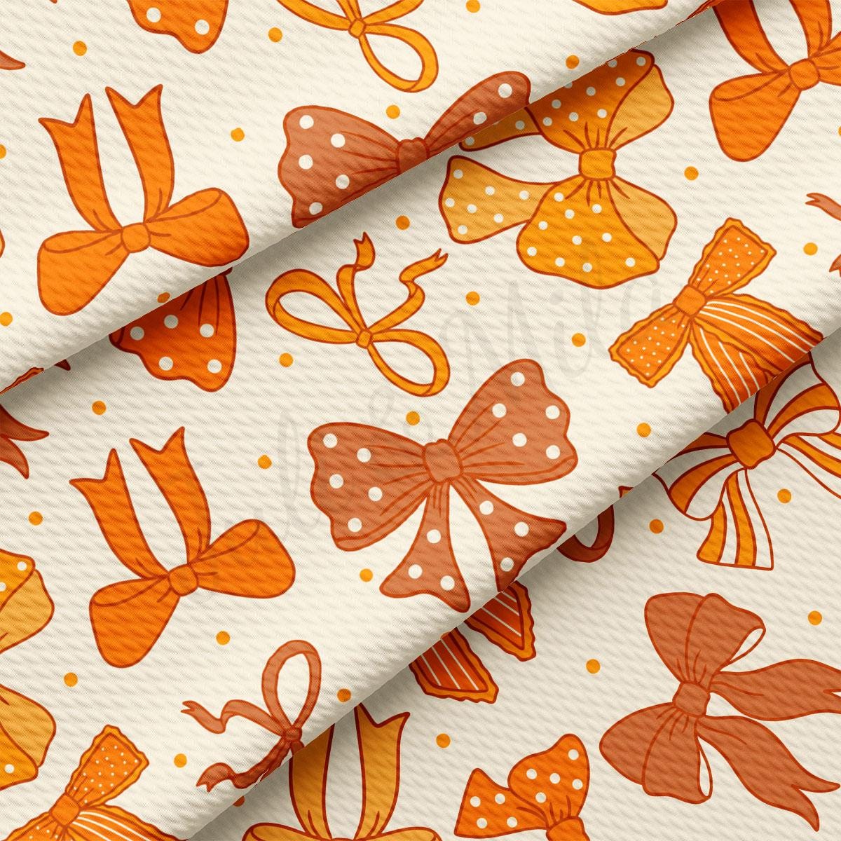 a repeating pattern of orange and white bows on a white background.