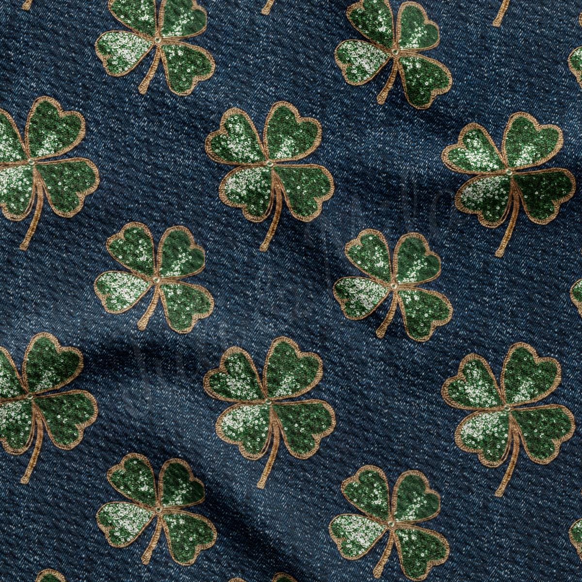 four leaf clovers on a blue background