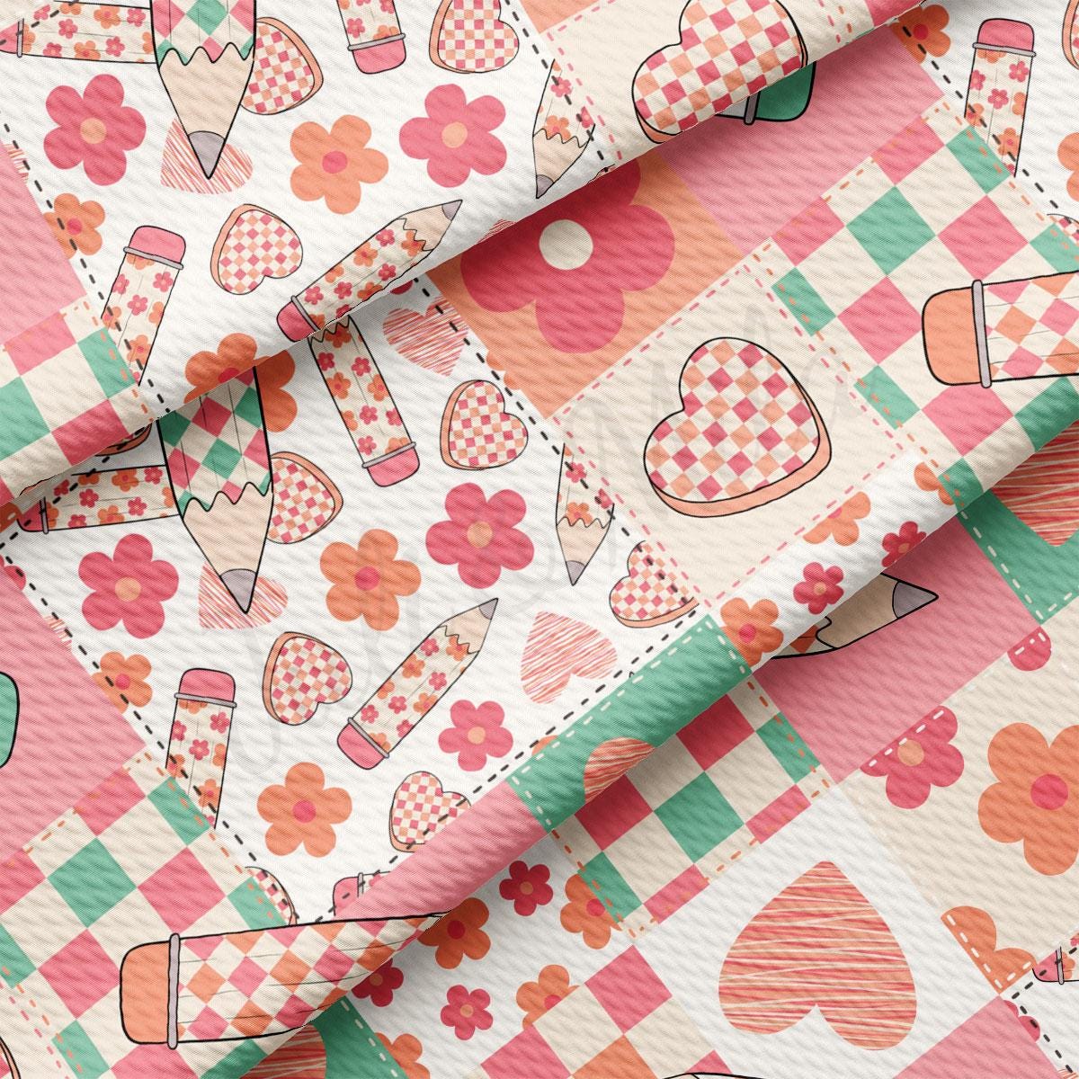 a close up of a pattern of hearts and flowers