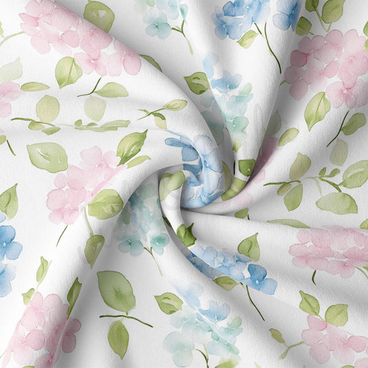 a close-up view of a fabric with a floral pattern. The fabric is white and has a repeating pattern of pink flowers and green leaves. The pattern is intricate and detailed, with the flowers and leaves appearing in various sizes and orientations. The fabric appears to be made of a soft, plush material, and the colors are vibrant and eye-catching.