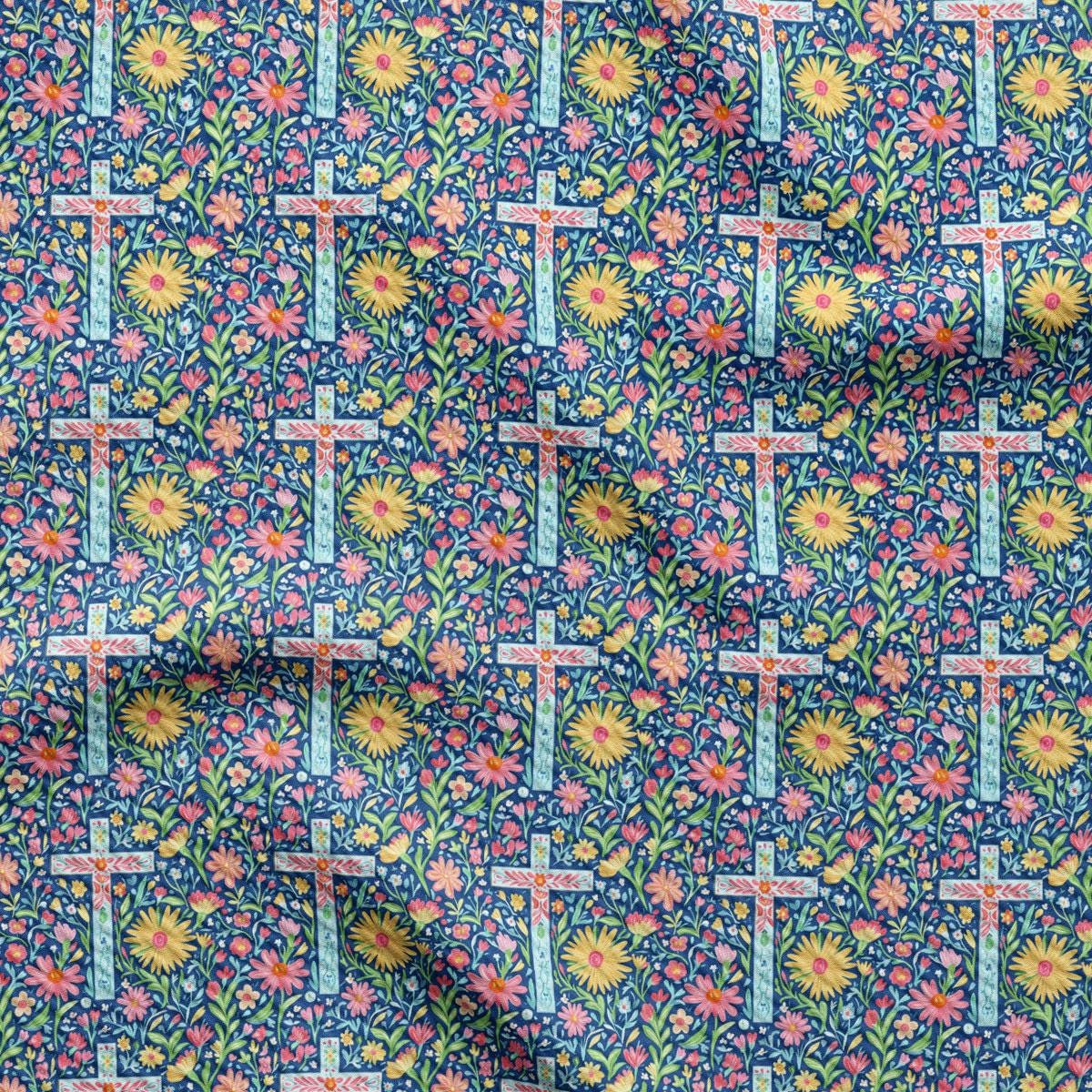 a close up of a blue and yellow floral print fabric
