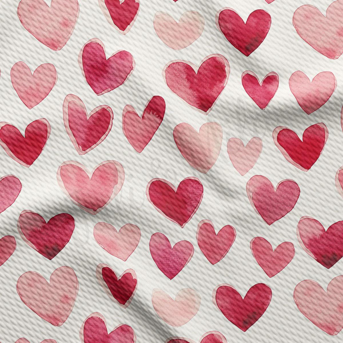 a repeating pattern of pink and red hearts on a white background.