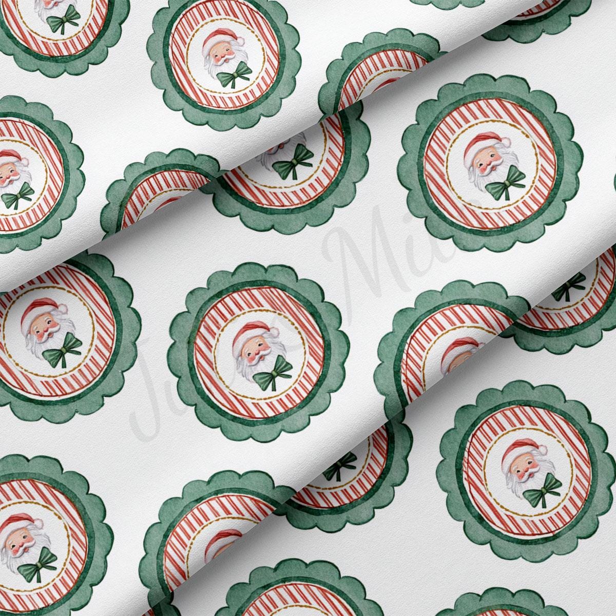 a repeating pattern of Santa Claus and green scalloped edges on a white background.