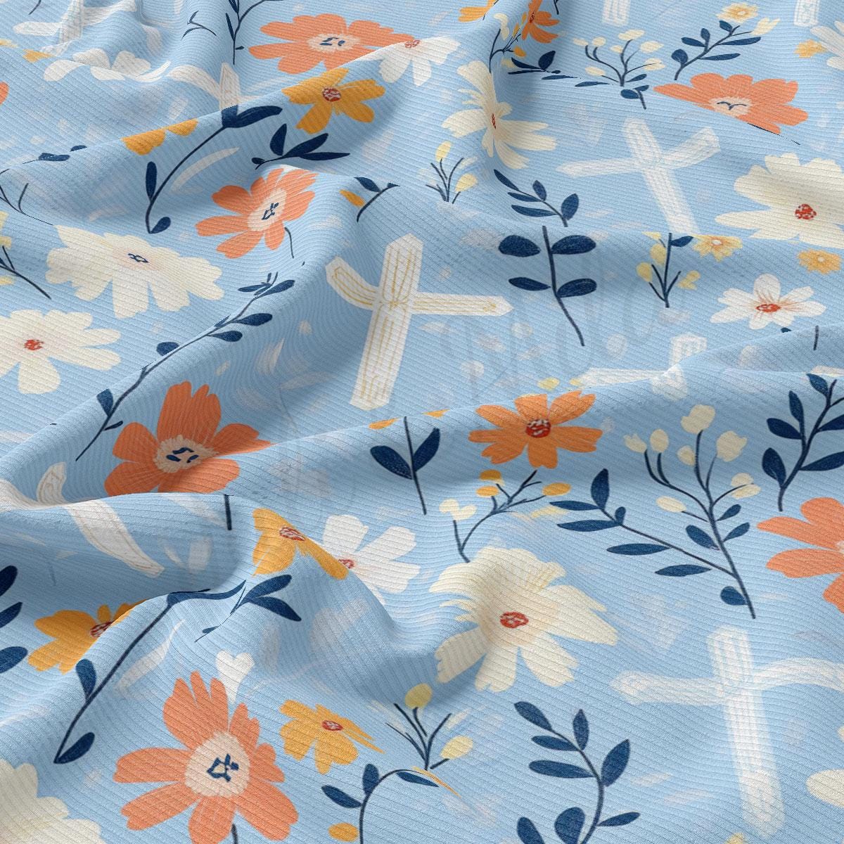 a close up of a blue and orange flowered fabric