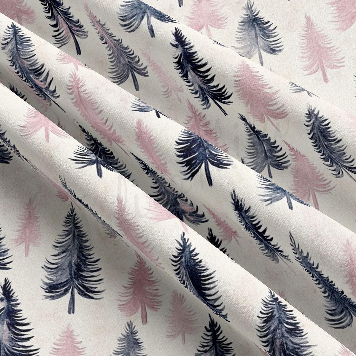 a close-up view of a fabric with a repeating pattern of stylized pine trees in shades of pink and blue.
