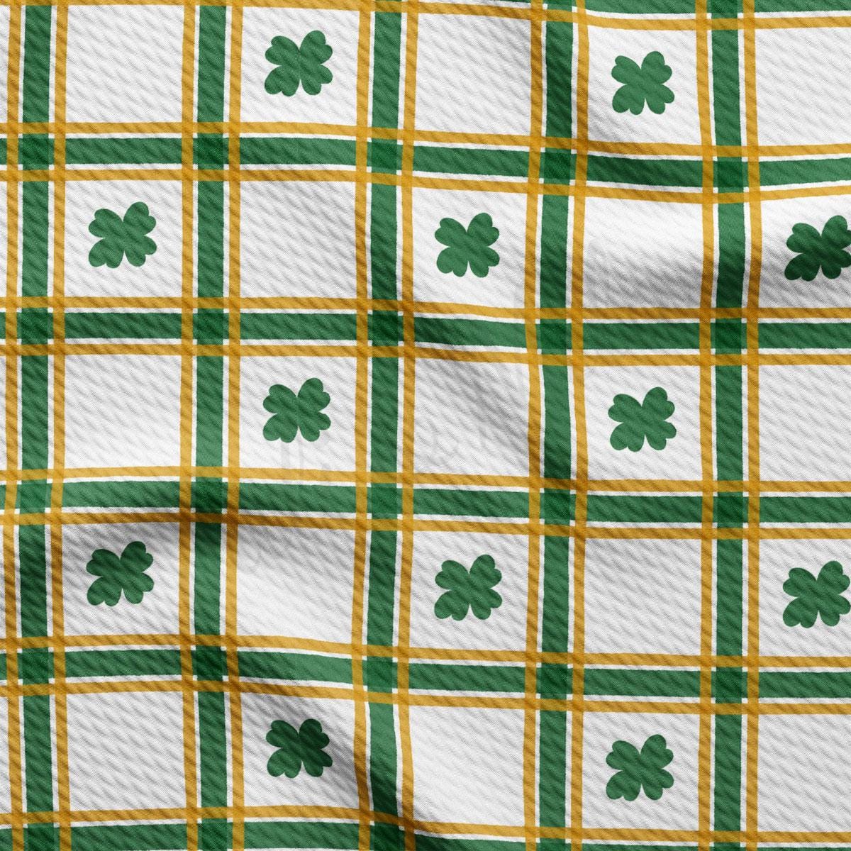 a green and white plaid with shamrocks on it