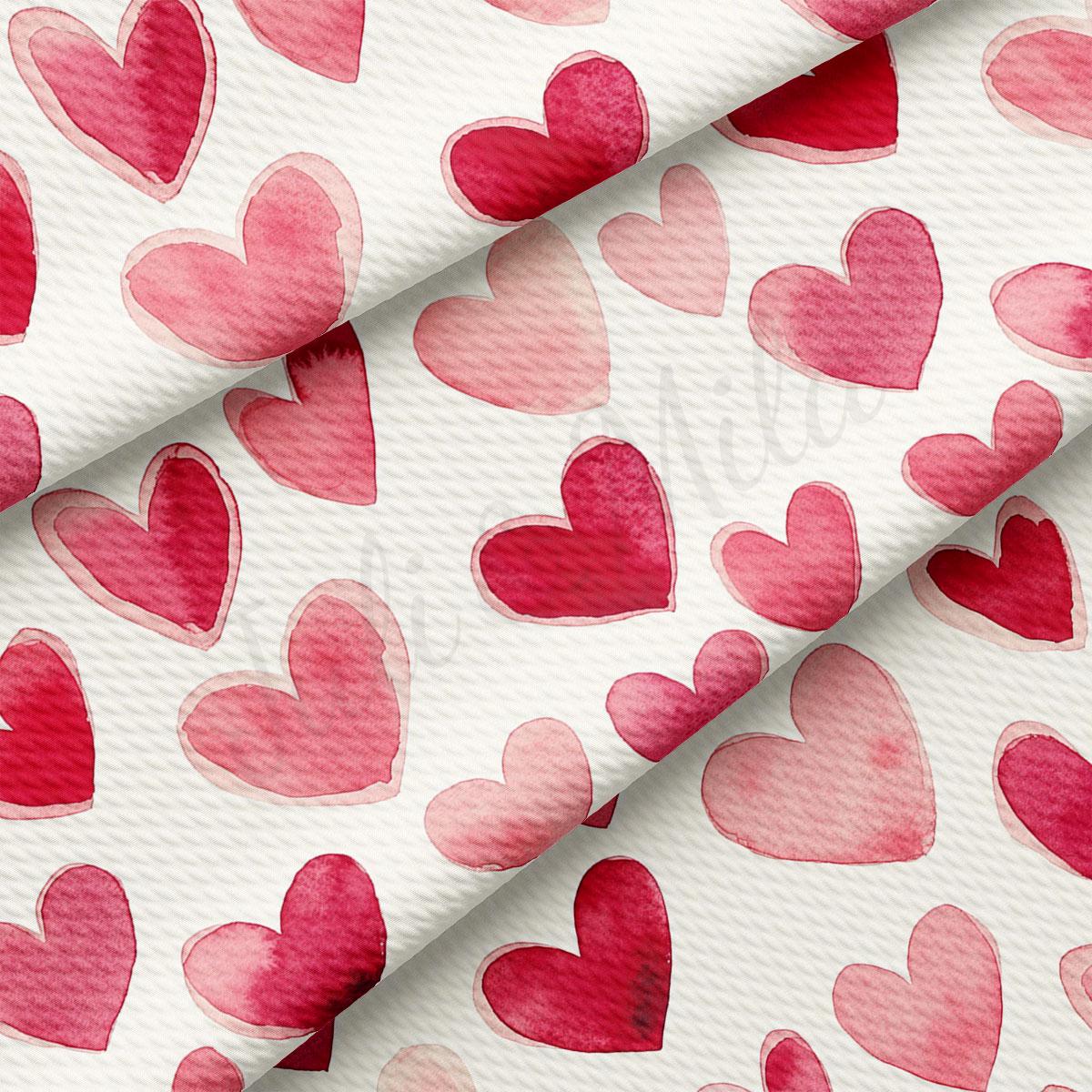 a repeating pattern of pink hearts on a white background.