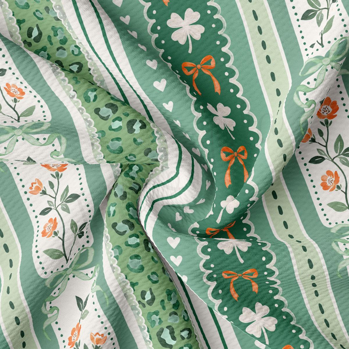 The image is a close-up of a fabric with a repeating pattern of green and white stripes, along with floral and leopard print elements. The fabric appears to be made of a soft, textured material, and the colors are vibrant and eye-catching.