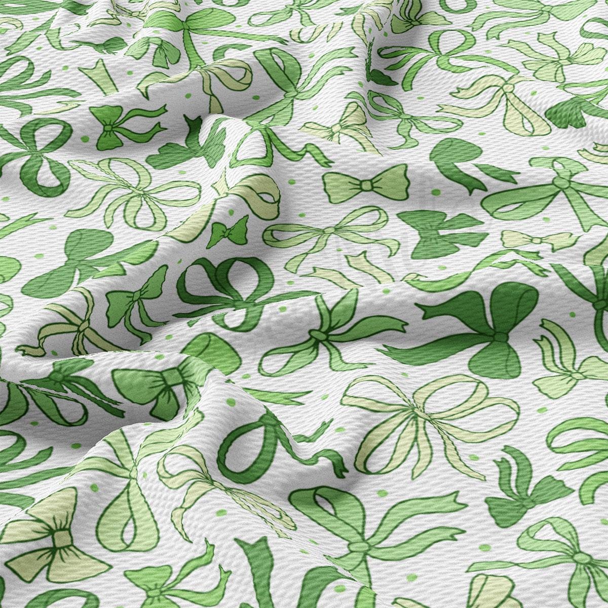 a close up of a green and white fabric