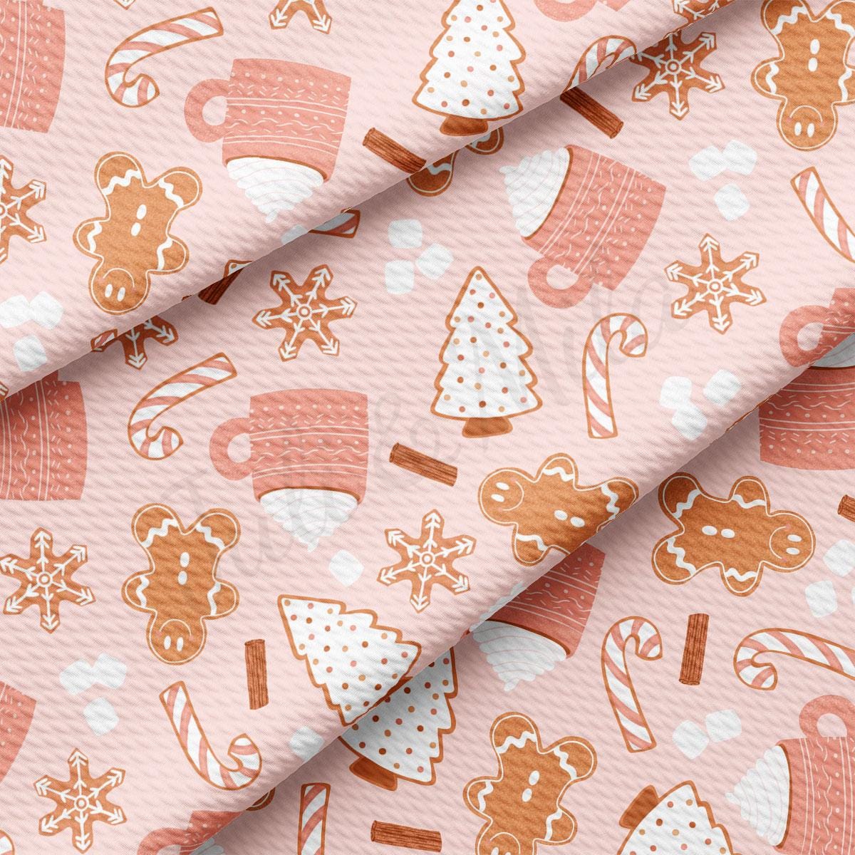 a close up of a pink and orange christmas pattern