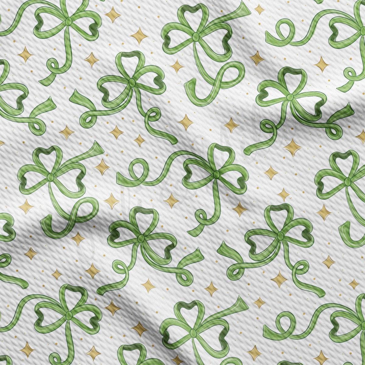 a close up of a green ribbon on a white background