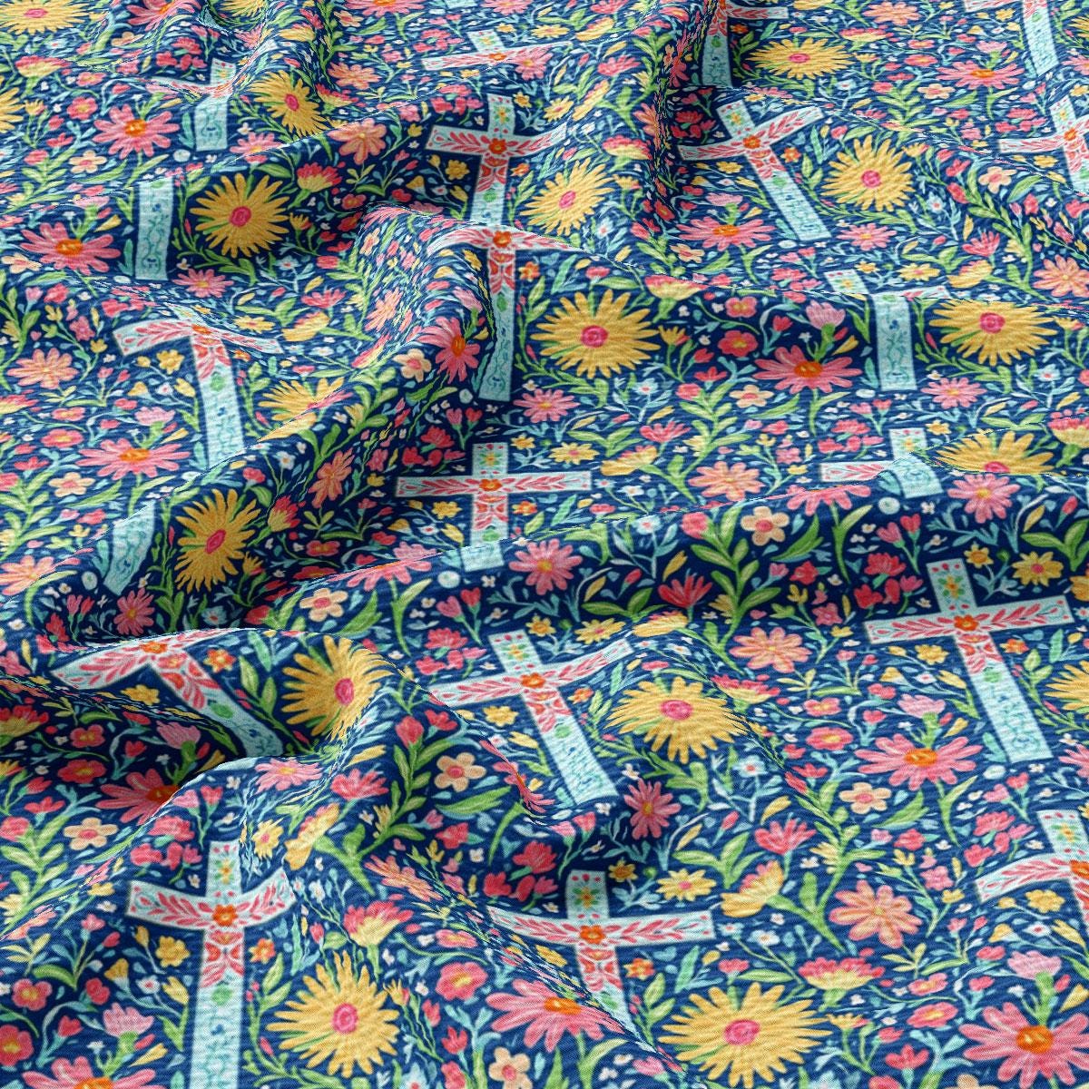 a close up of a colorful fabric with flowers on it