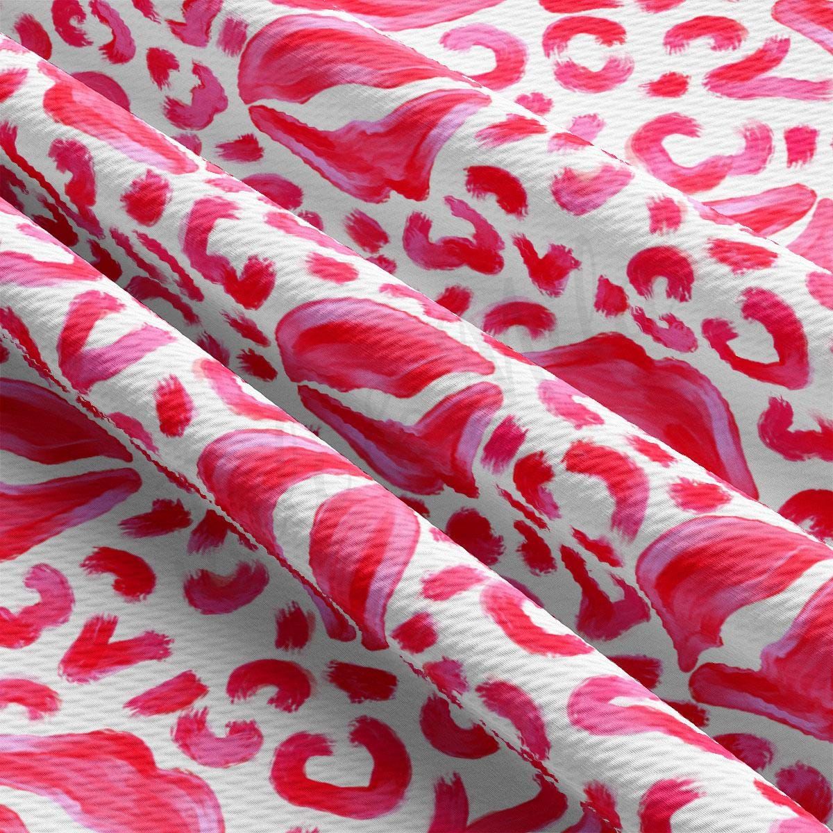 a red and white animal print fabric