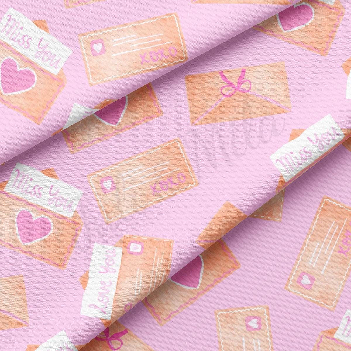 a pink background with a pattern of envelopes and hearts