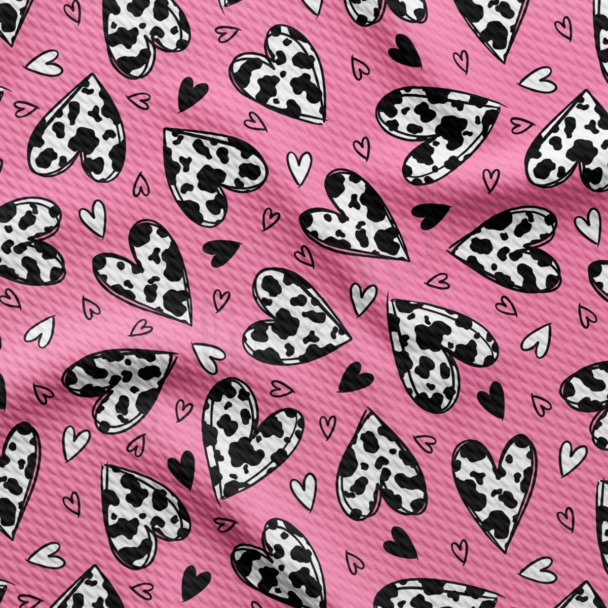 a pink background with black and white hearts