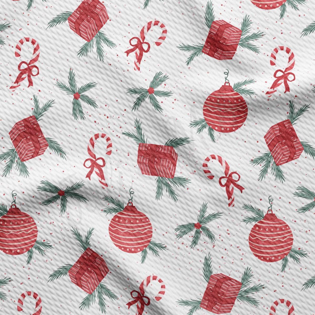 a red and green christmas ornament on a white background