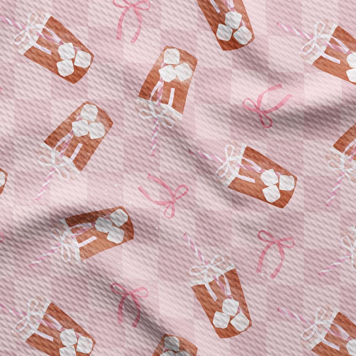 a pink background with candy boxes and bows