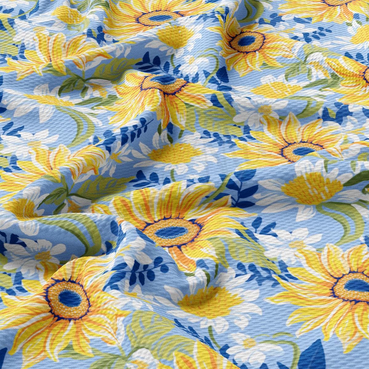 a blue and yellow floral print fabric