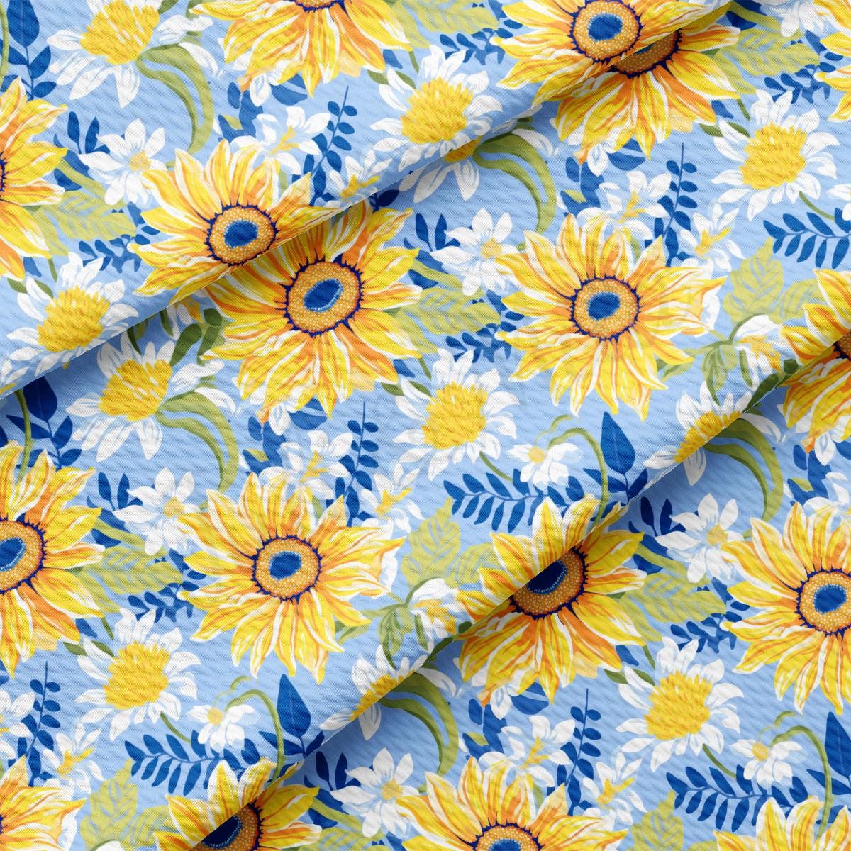 a blue and yellow floral print fabric
