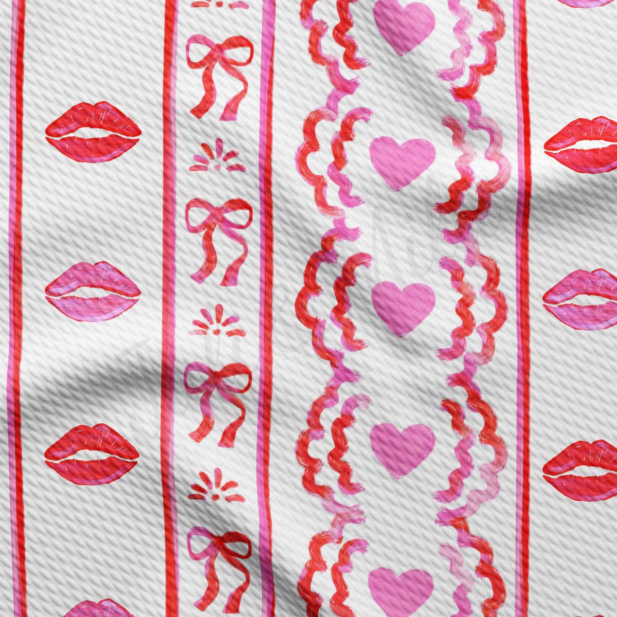 a close up of a red and white scarf with lipstick prints