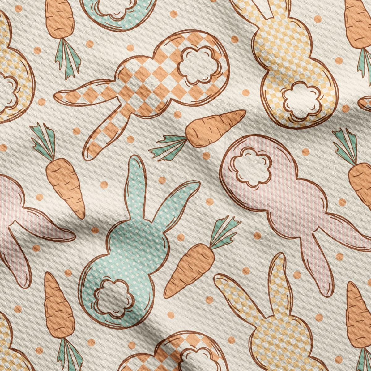 a pattern of rabbits and carrots on a white background
