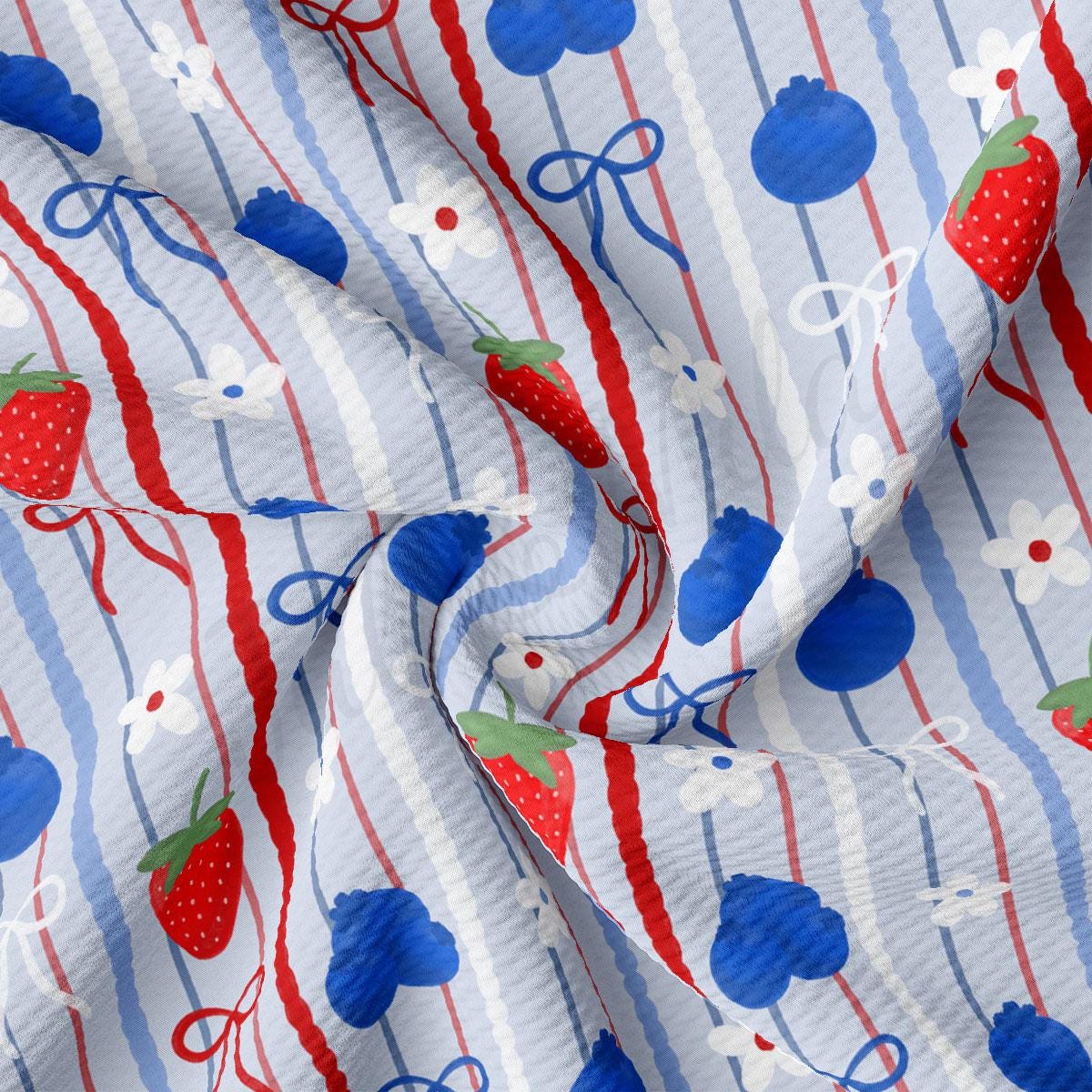 a red, white and blue striped fabric with a strawberry on it