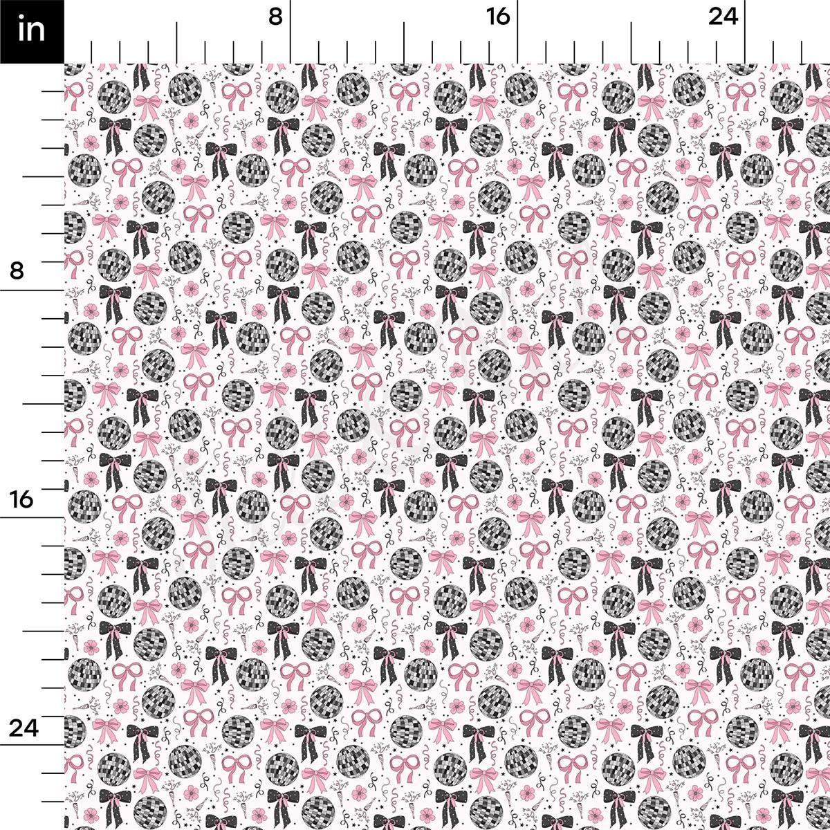 a ruler with a pink and black pattern on it