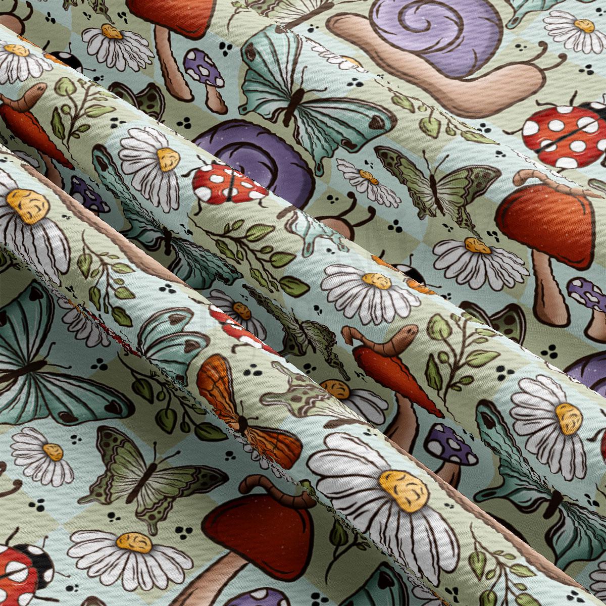 The image is a close-up view of a fabric with a repeating pattern of various colorful insects, mushrooms, and flowers.