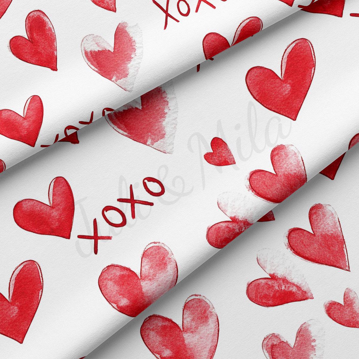 a repeating pattern of red hearts on a white background.