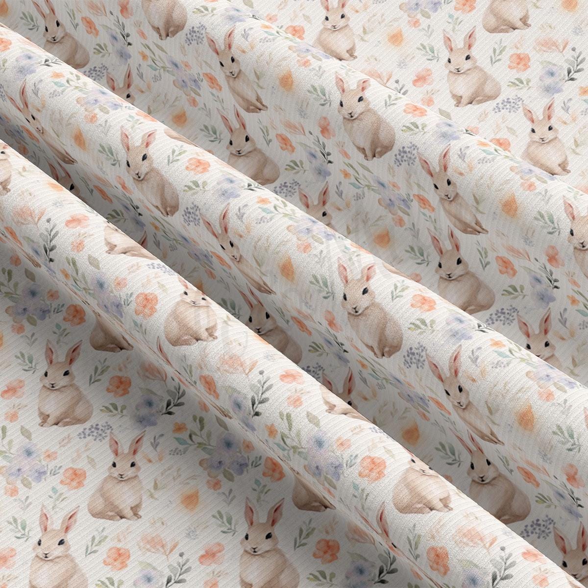 a close up of a wallpaper with rabbits on it